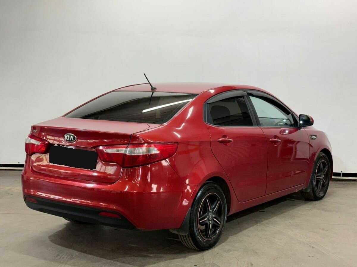 Kia Rio с пробегом — 2013 год. Фото: #4