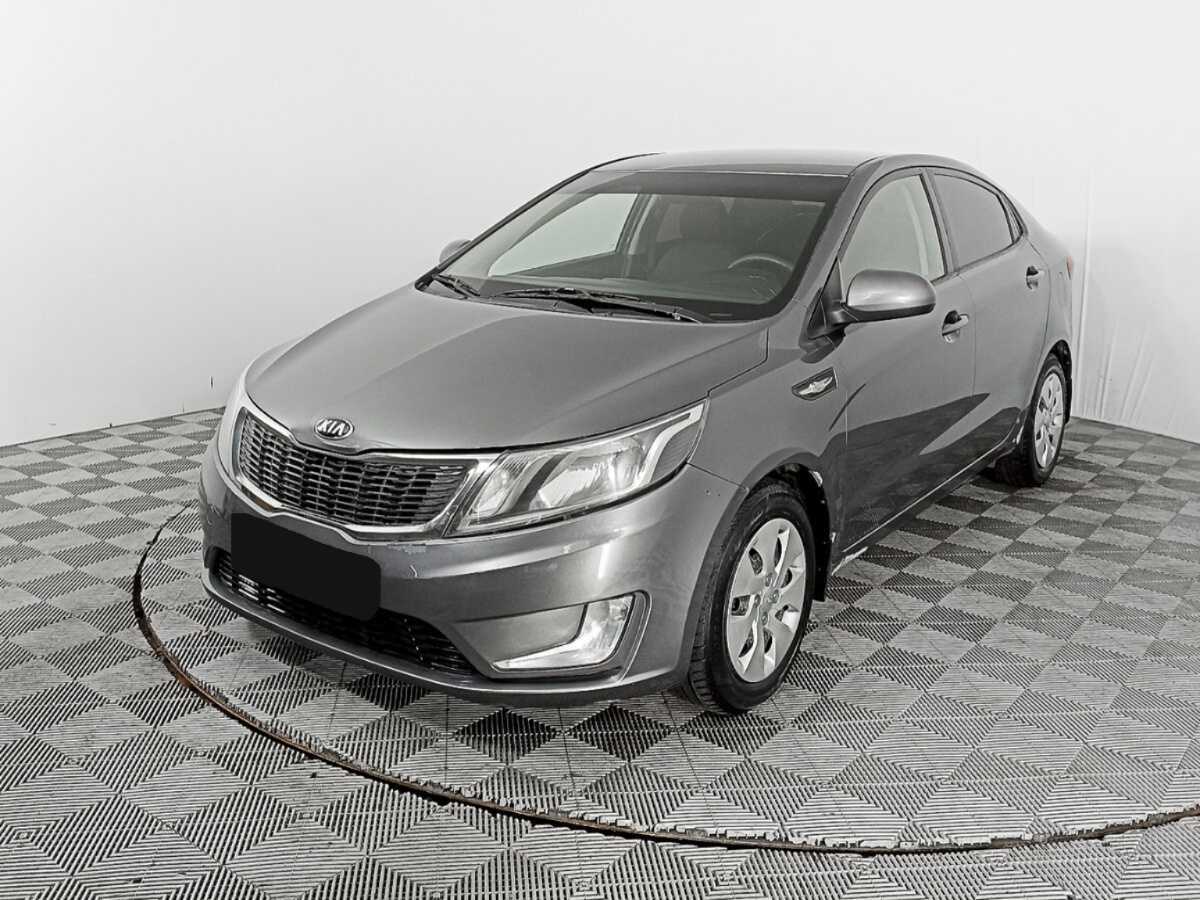 Kia Rio с пробегом — 2013 год. Фото: #0