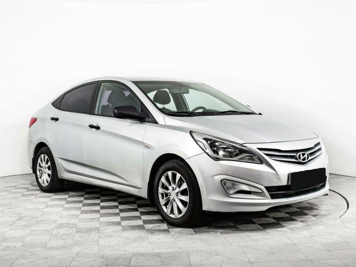 Hyundai Solaris с пробегом — 2014 год. Фото: #2