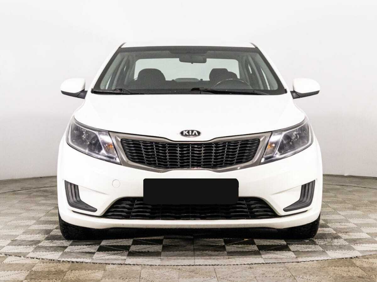 Kia Rio с пробегом — 2014 год. Фото: #1
