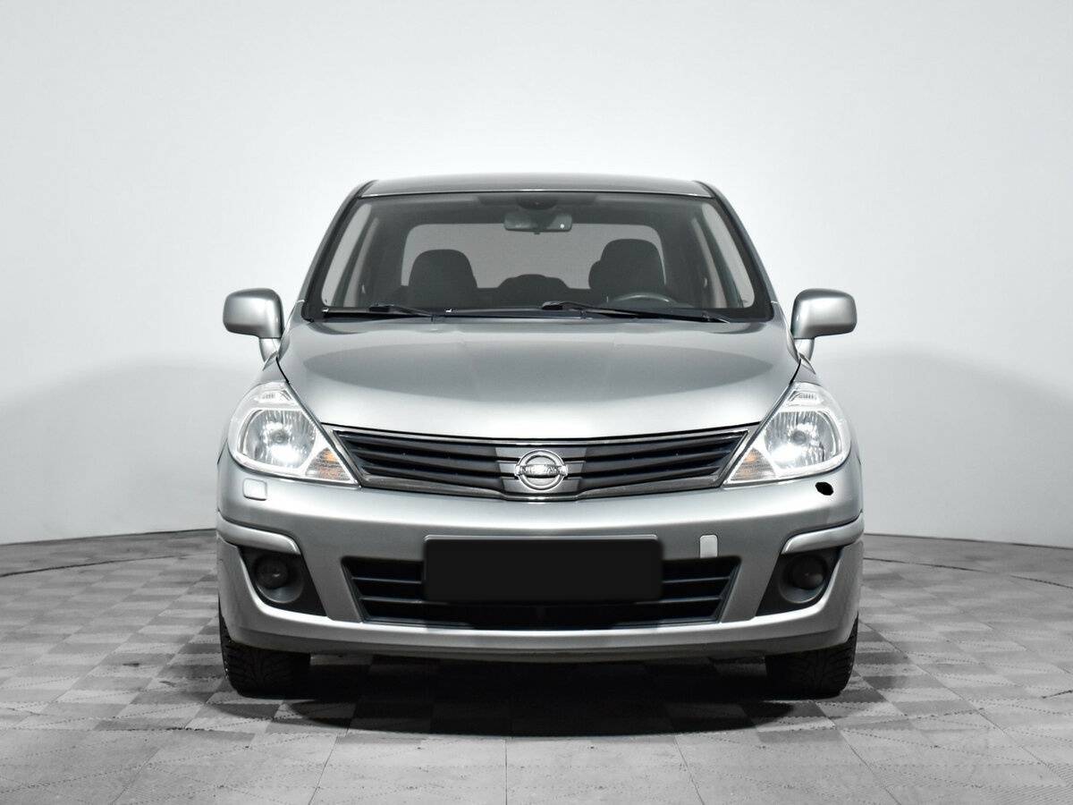 Nissan Tiida с пробегом — 2013 год. Фото: #1