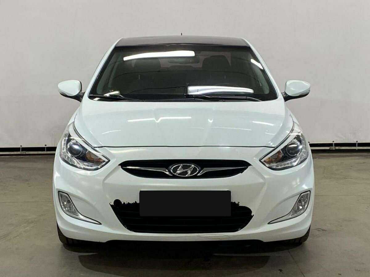 Hyundai Solaris с пробегом — 2013 год. Фото: #1