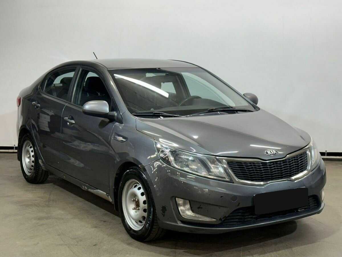 Kia Rio с пробегом — 2013 год. Фото: #2