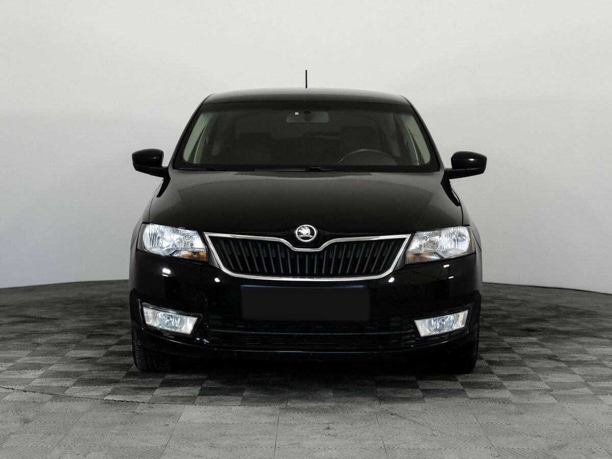 Skoda Rapid с пробегом — 2015 год. Фото: #1