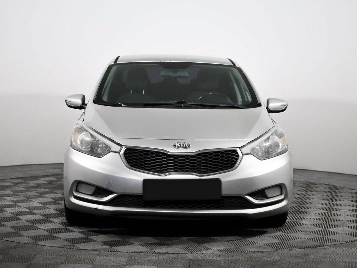 Kia Cerato с пробегом — 2013 год. Фото: #1