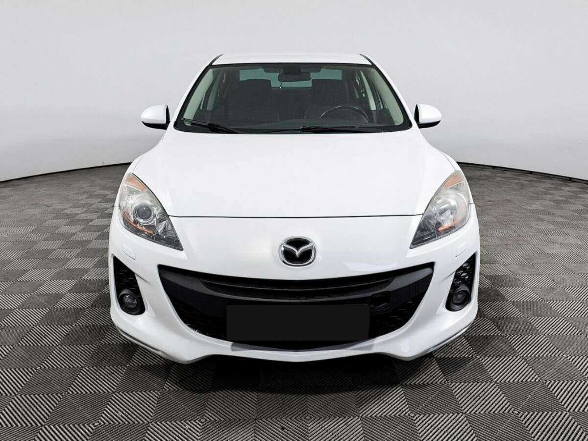 Mazda 3 с пробегом — 2013 год. Фото: #1