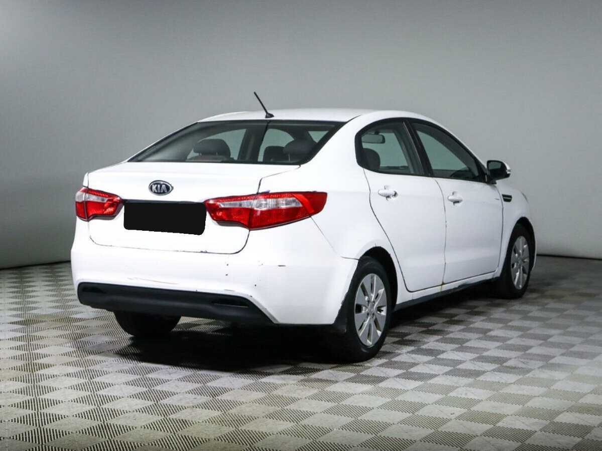 Kia Rio с пробегом — 2014 год. Фото: #4