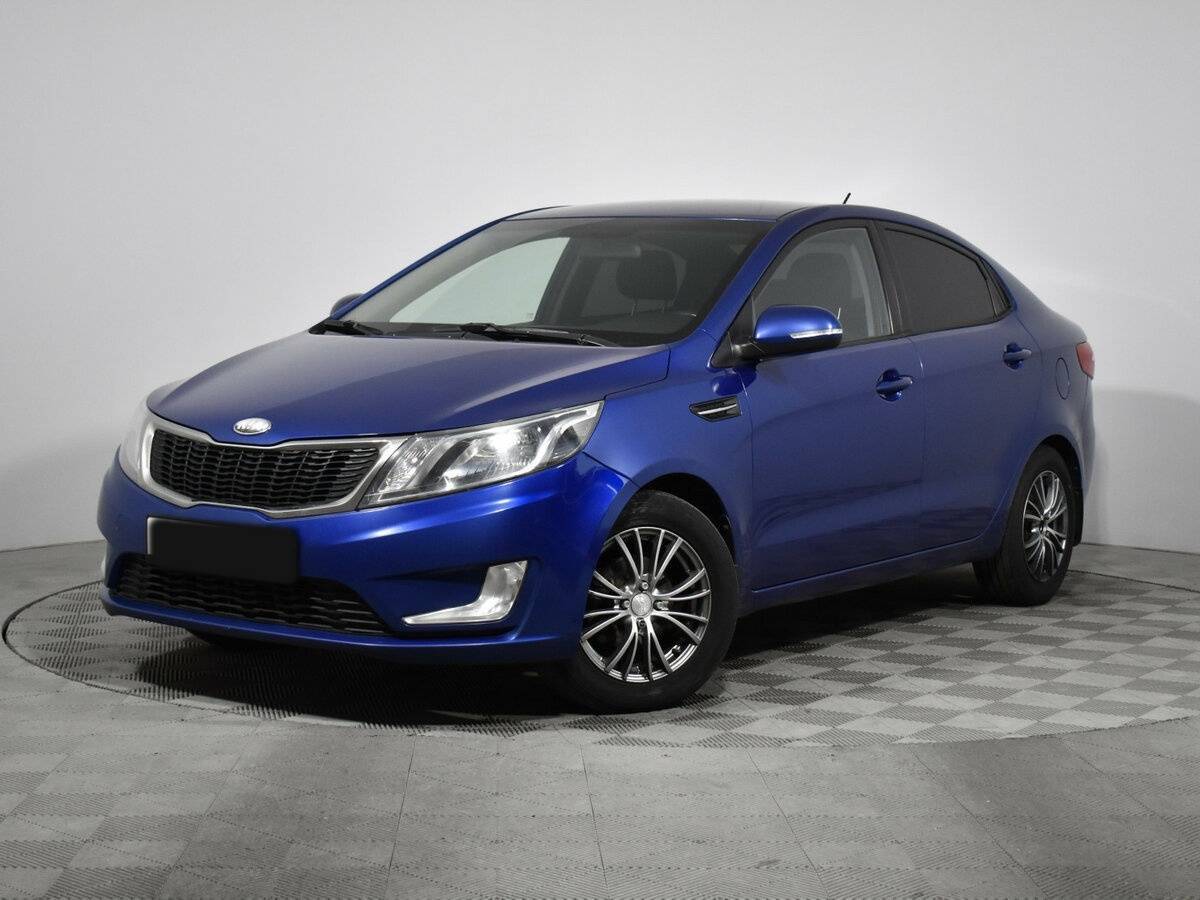 Kia Rio с пробегом — 2013 год. Фото: #0