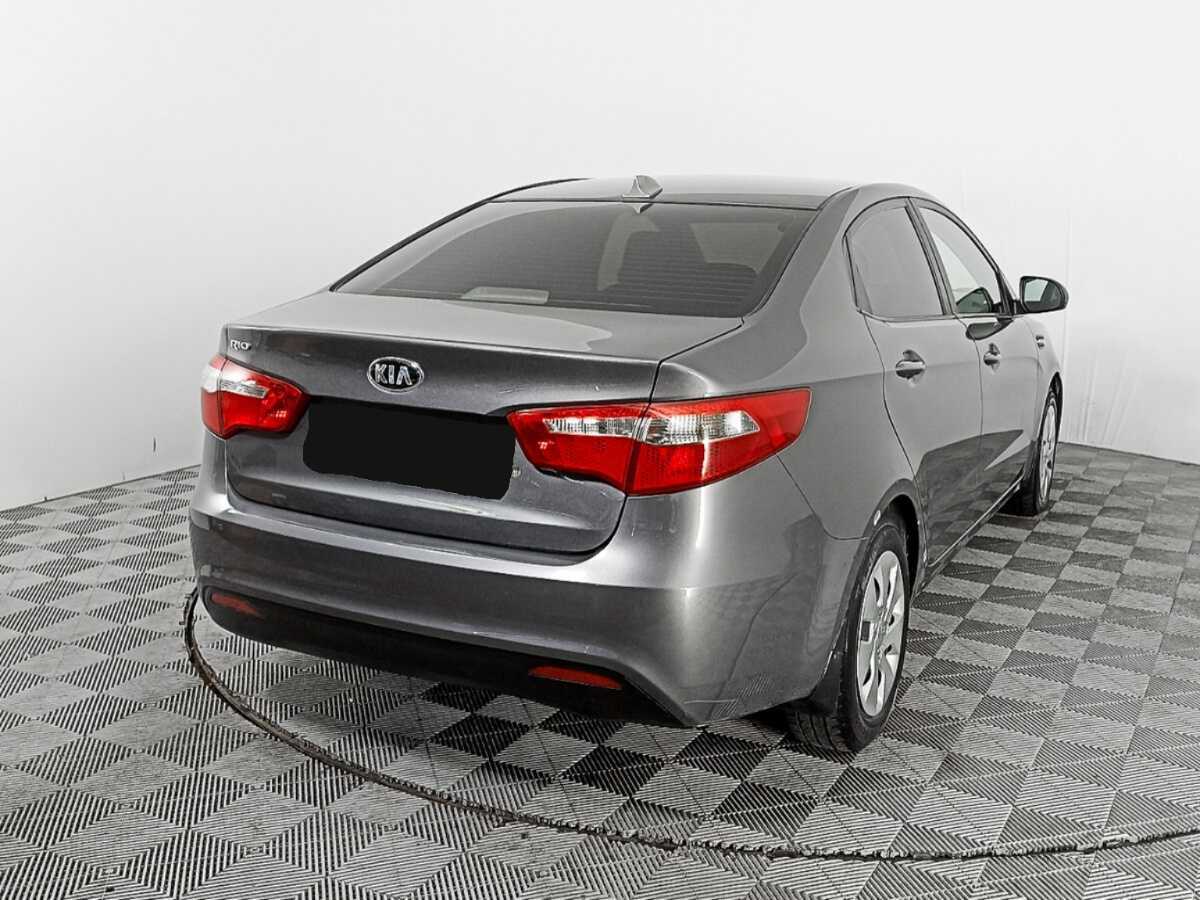 Kia Rio с пробегом — 2013 год. Фото: #2