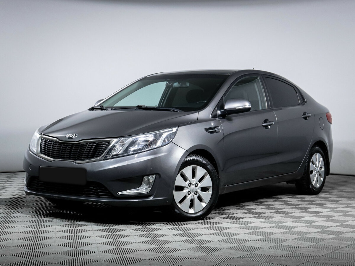 Kia Rio с пробегом — 2013 год. Фото: #0