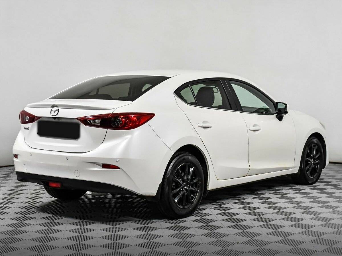 Mazda 3 с пробегом — 2014 год. Фото: #3