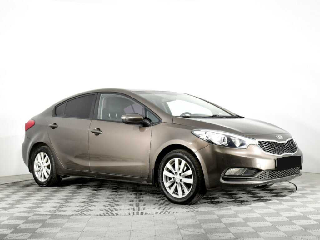 Kia Cerato с пробегом — 2015 год. Фото: #2