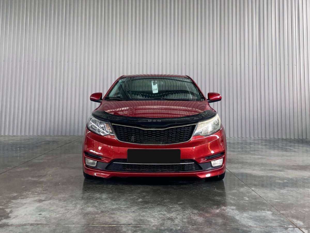 Kia Rio с пробегом — 2015 год. Фото: #1