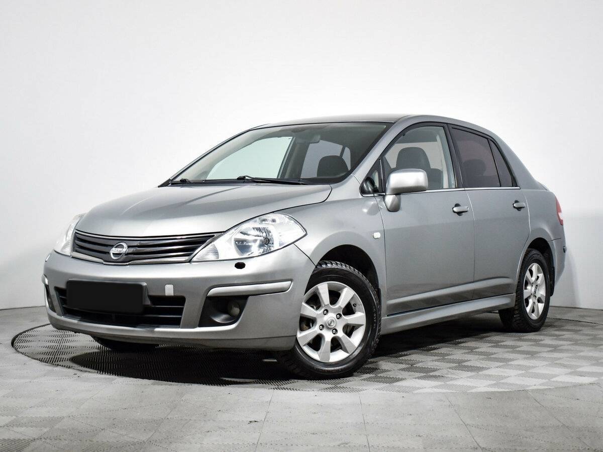 Nissan Tiida с пробегом — 2013 год. Фото: #0