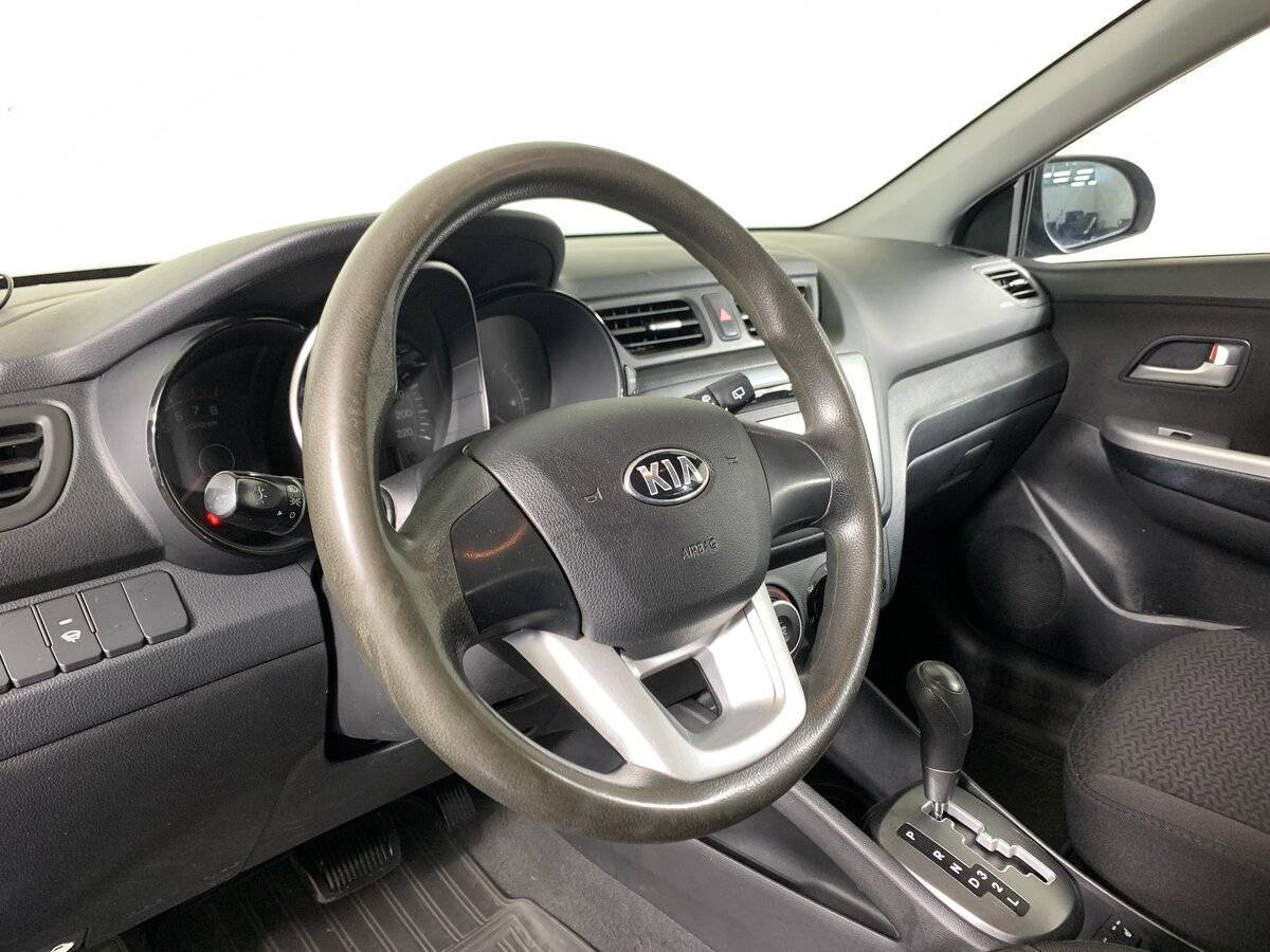 Kia Rio с пробегом — 2013 год. Фото: #9