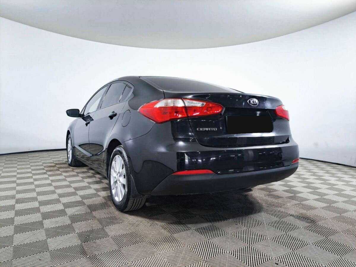 Kia Cerato с пробегом — 2014 год. Фото: #6