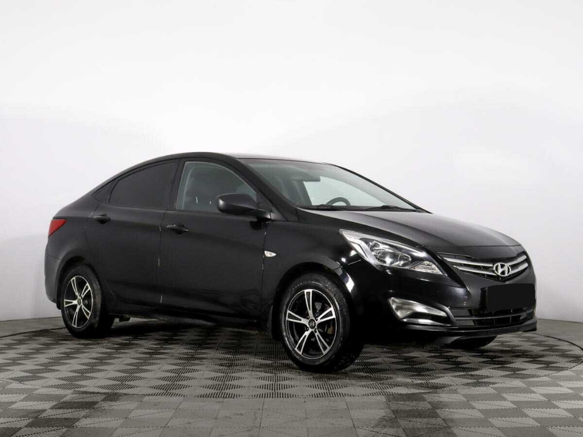 Hyundai Solaris с пробегом — 2014 год. Фото: #2