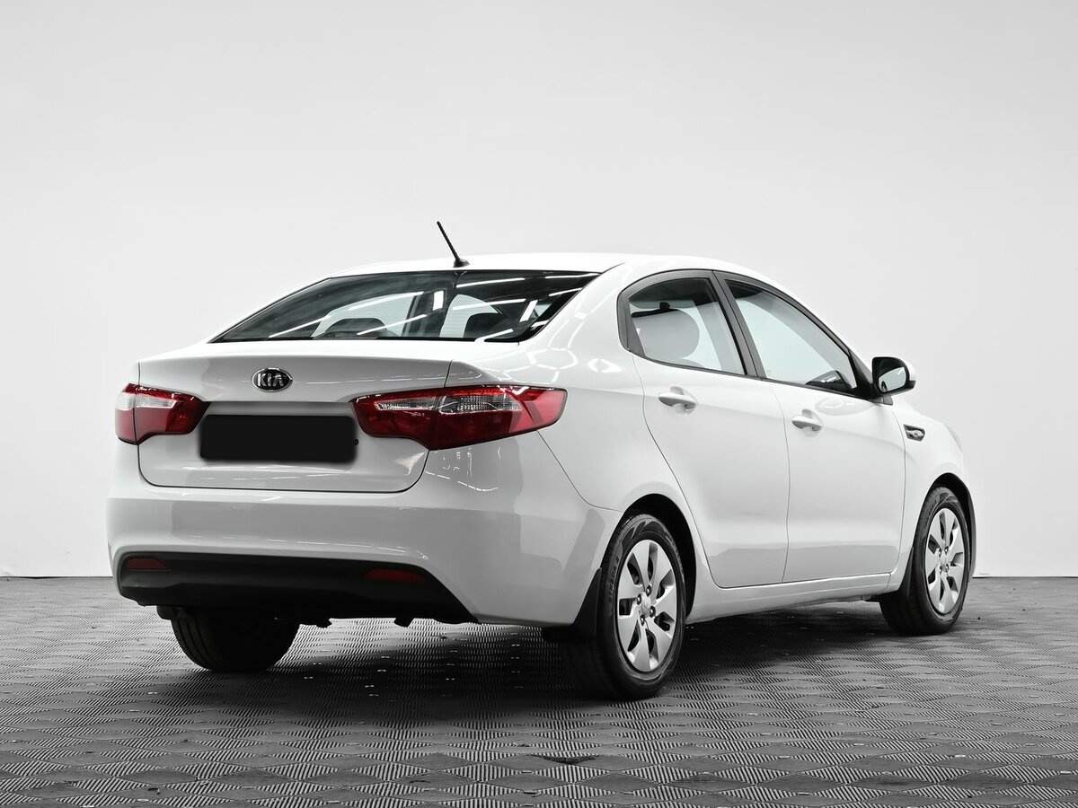 Kia Rio с пробегом — 2013 год. Фото: #3