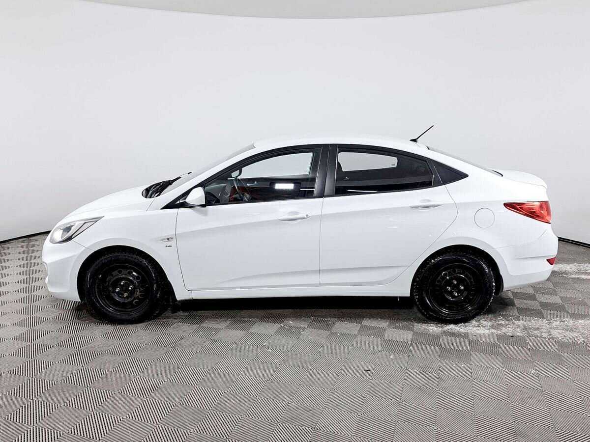 Hyundai Solaris с пробегом — 2013 год. Фото: #7