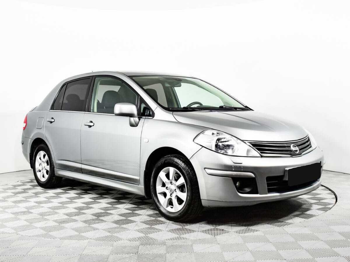 Nissan Tiida с пробегом — 2013 год. Фото: #2