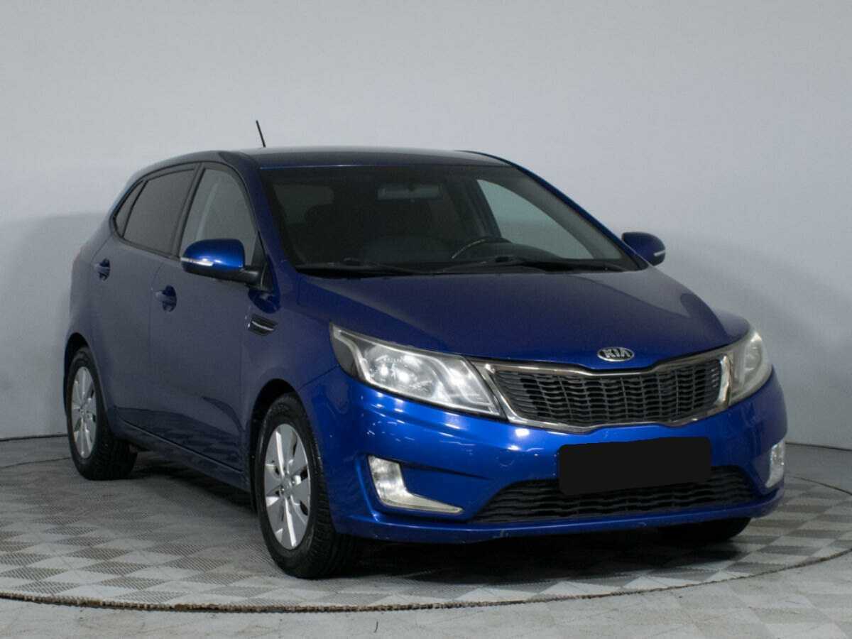 Kia Rio с пробегом — 2013 год. Фото: #2