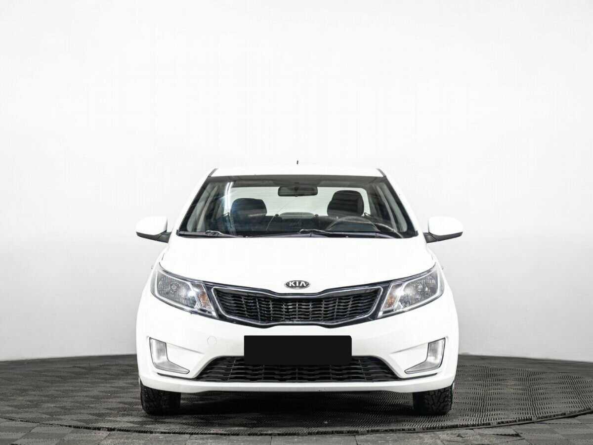 Kia Rio с пробегом — 2013 год. Фото: #1