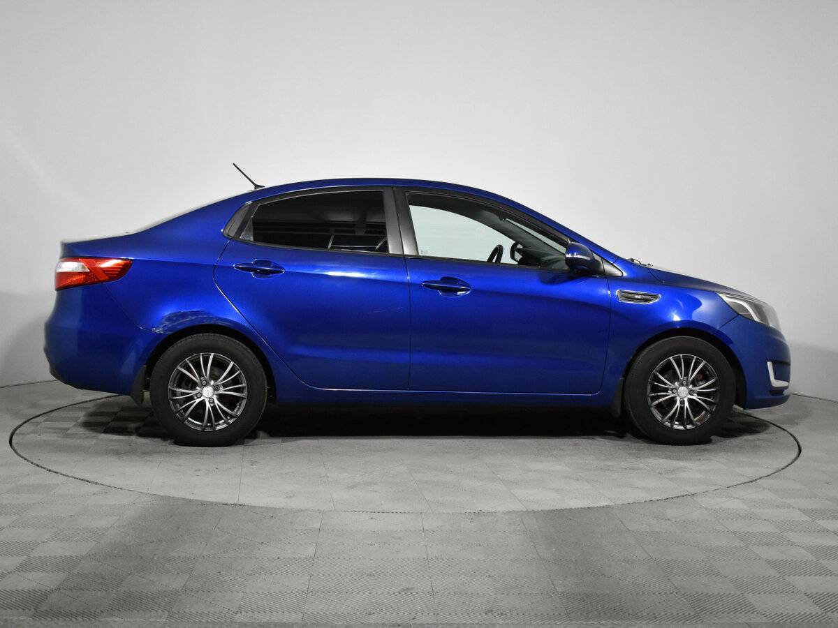 Kia Rio с пробегом — 2013 год. Фото: #3
