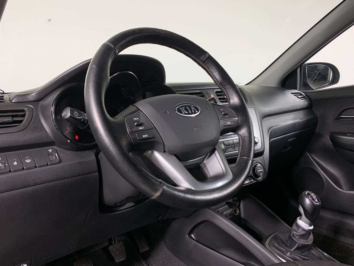 Kia Rio с пробегом — 2012 год. Фото: #11