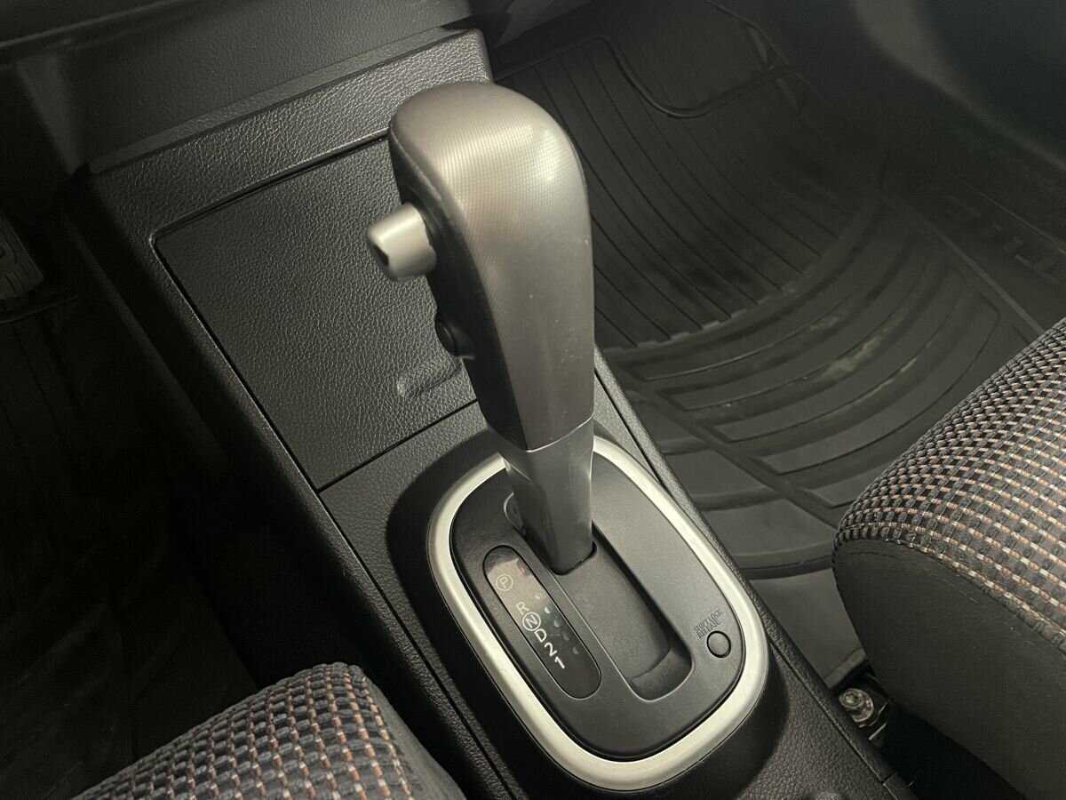 Nissan Tiida с пробегом — 2013 год. Фото: #12