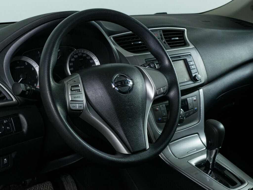 Nissan Tiida с пробегом — 2015 год. Фото: #11