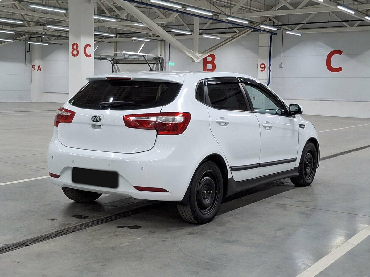 Kia Rio с пробегом — 2014 год. Фото: #4