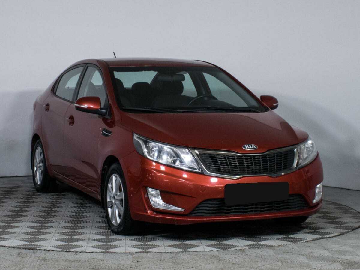 Kia Rio с пробегом — 2013 год. Фото: #2