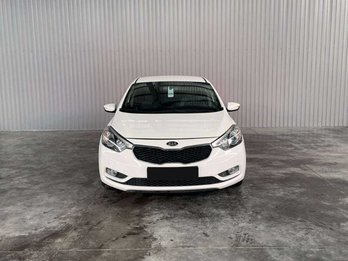 Kia Cerato с пробегом — 2014 год. Фото: #1