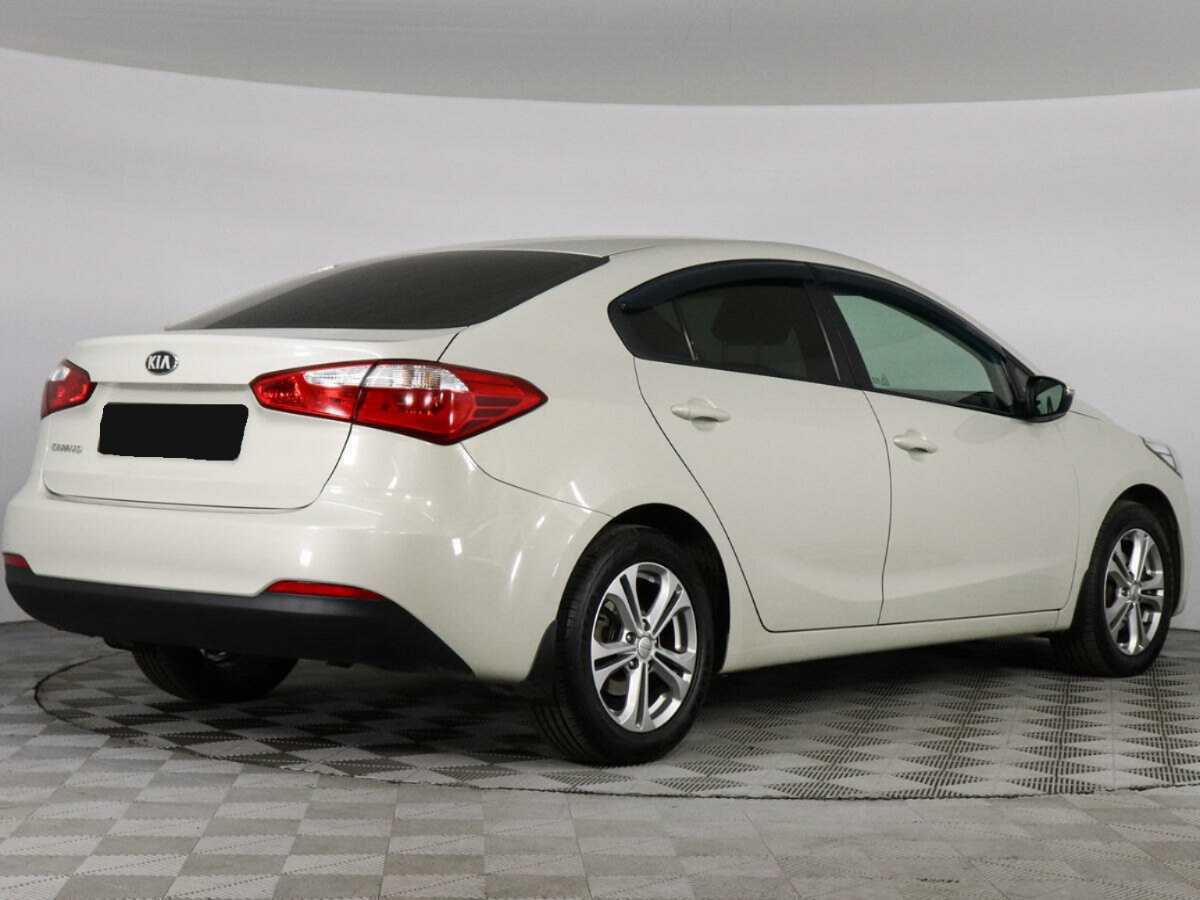 Kia Cerato с пробегом — 2013 год. Фото: #4