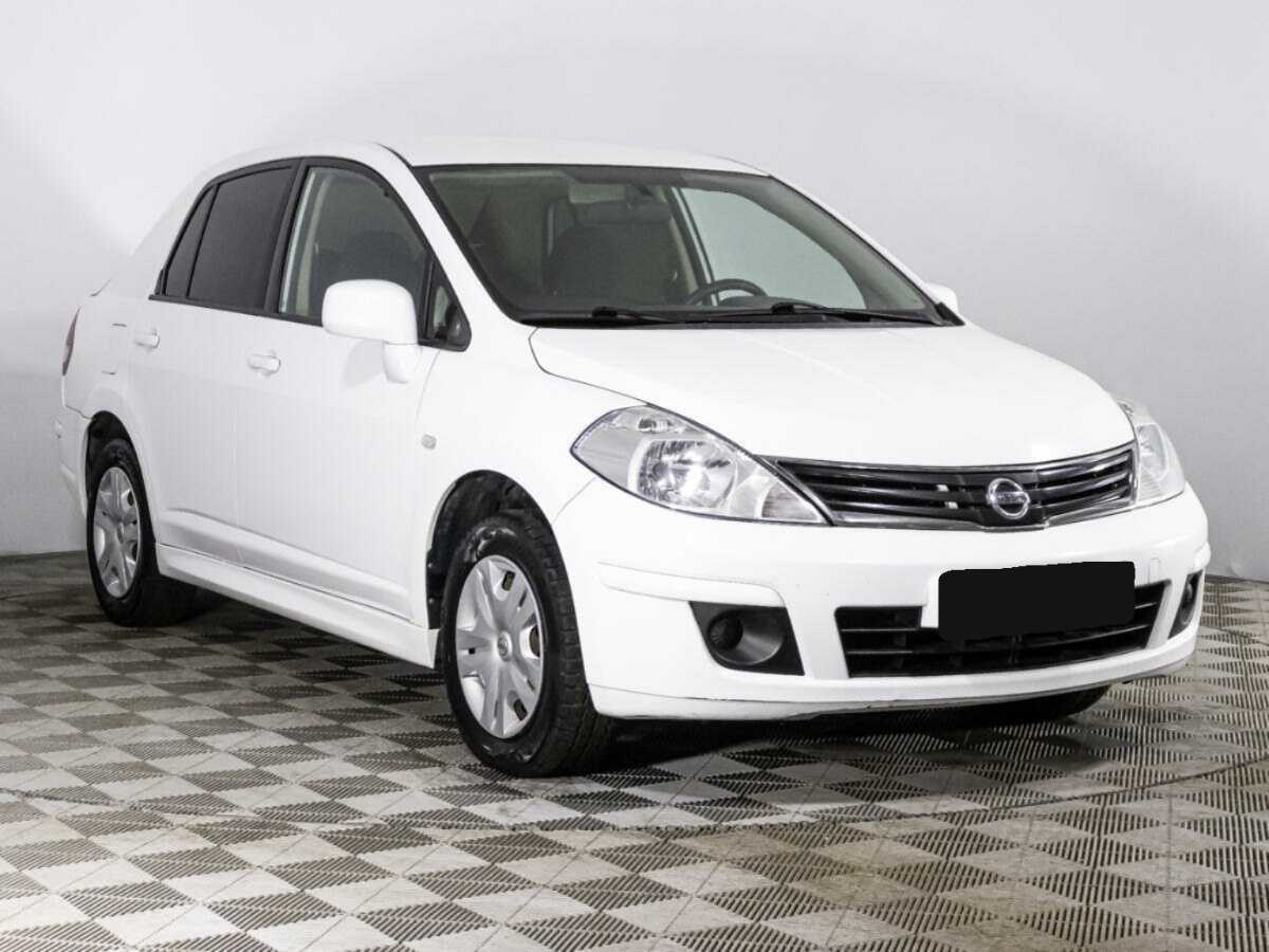 Nissan Tiida с пробегом — 2013 год. Фото: #2
