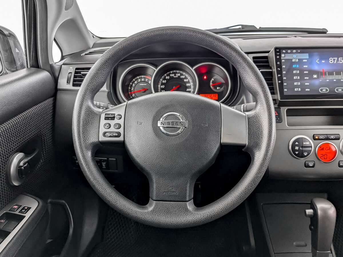 Nissan Tiida с пробегом — 2013 год. Фото: #16