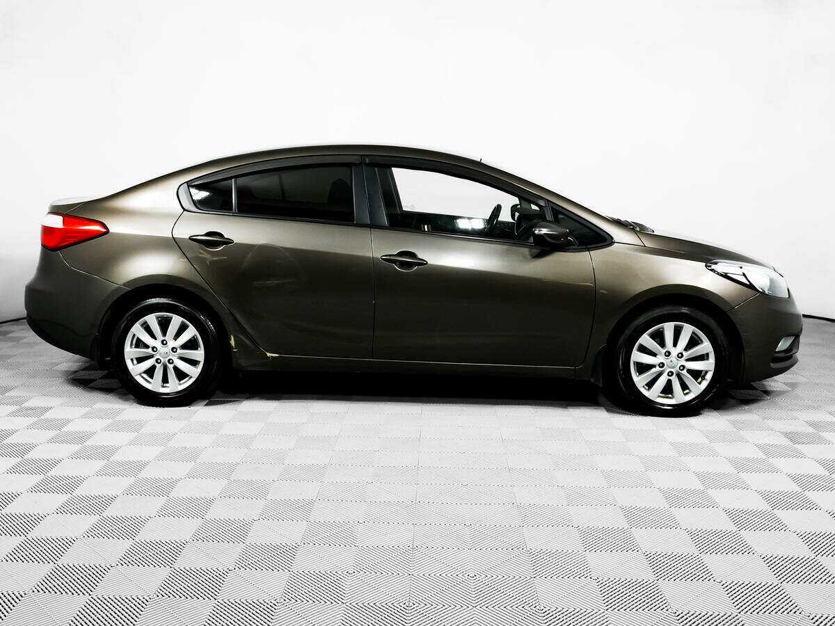 Kia Cerato с пробегом — 2014 год. Фото: #3