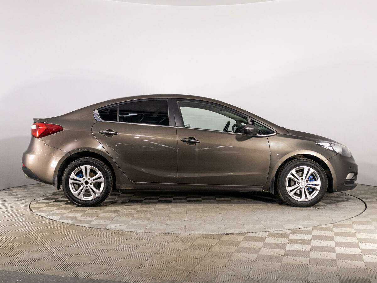 Kia Cerato с пробегом — 2014 год. Фото: #3