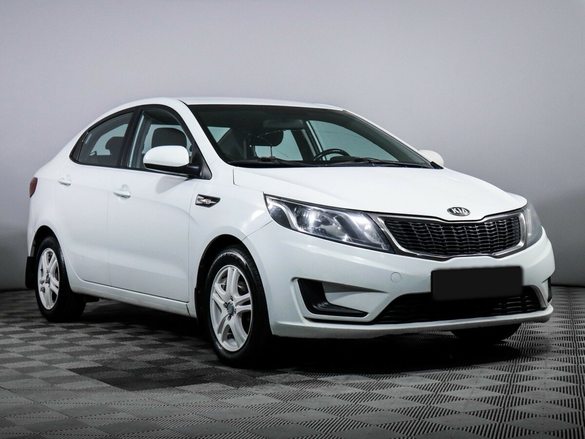 Kia Rio с пробегом — 2014 год. Фото: #2