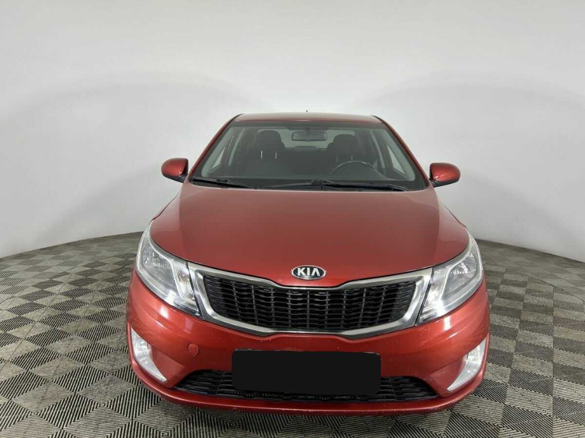 Kia Rio с пробегом — 2014 год. Фото: #1