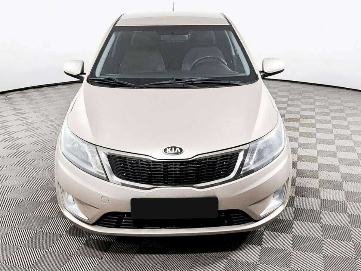 Kia Rio с пробегом — 2013 год. Фото: #1