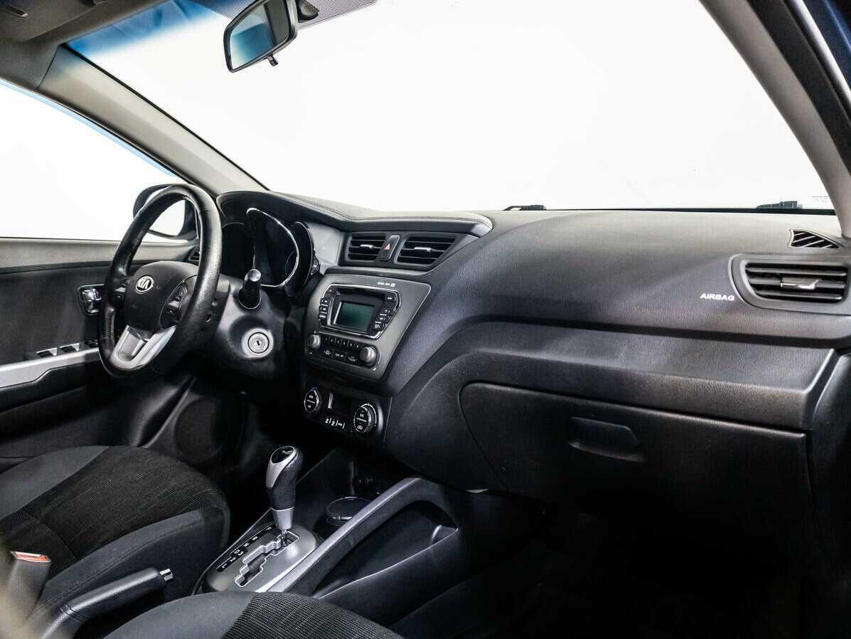 Kia Rio с пробегом — 2013 год. Фото: #7