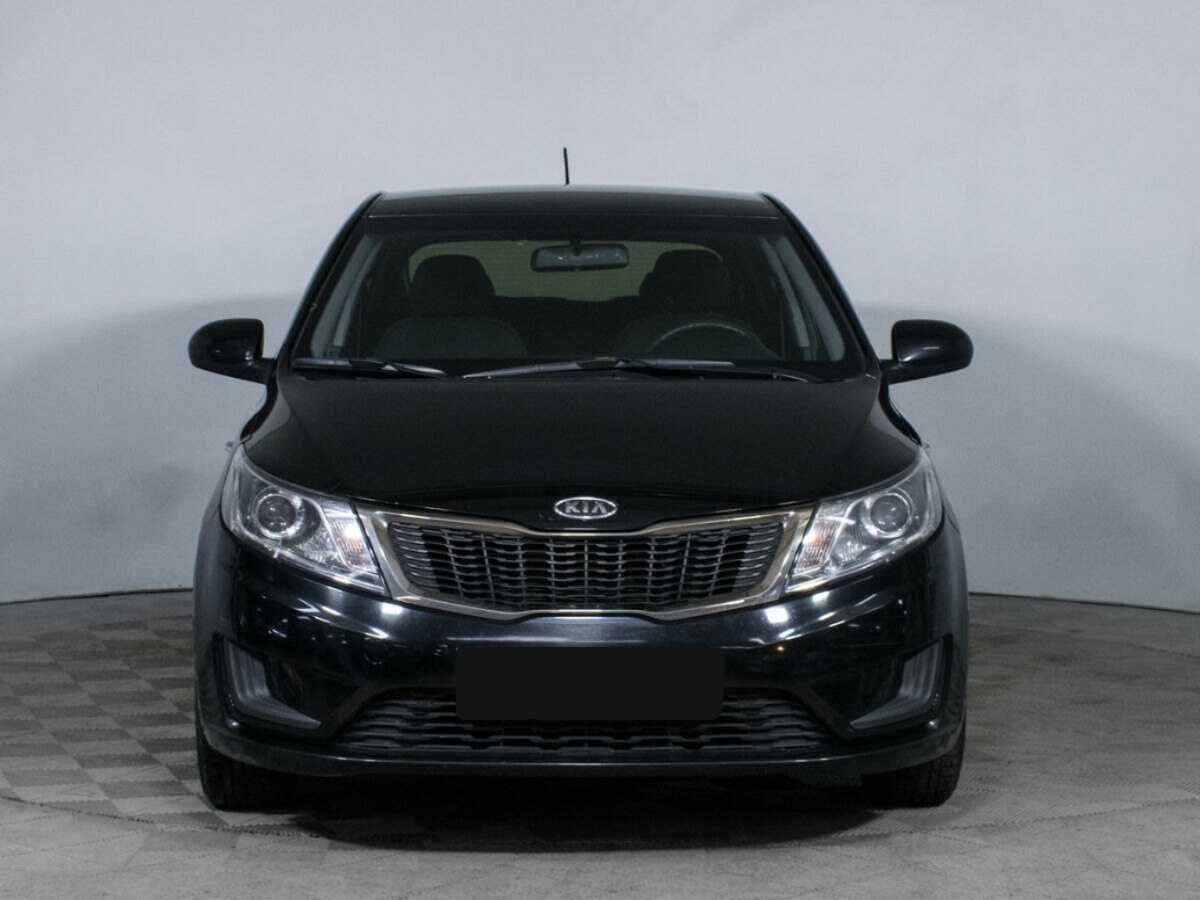 Kia Rio с пробегом — 2012 год. Фото: #1