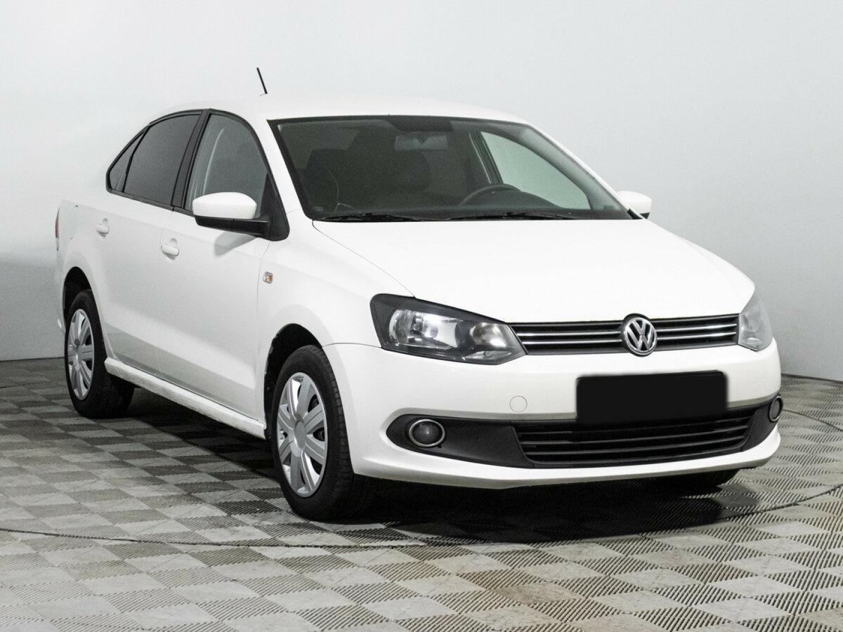 Volkswagen Polo с пробегом — 2013 год. Фото: #2