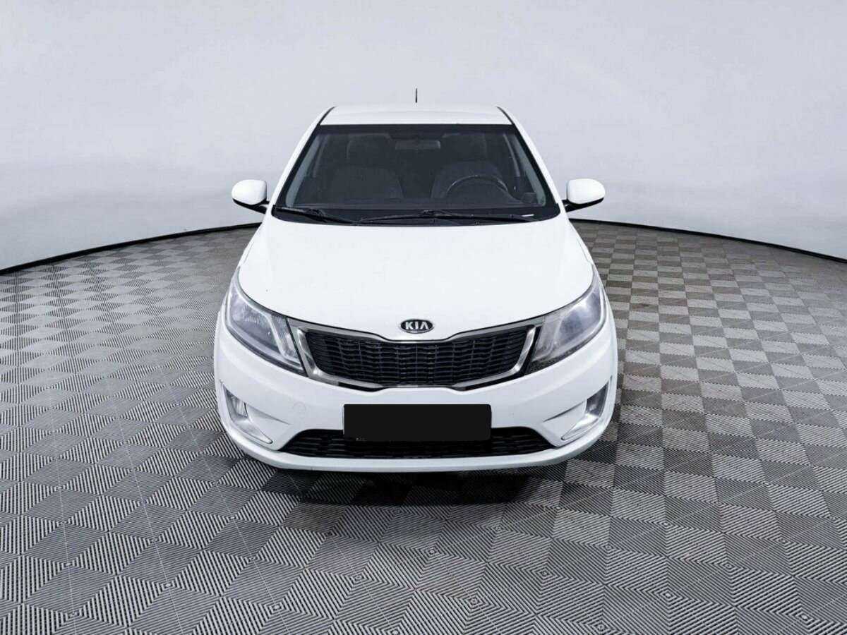 Kia Rio с пробегом — 2012 год. Фото: #1
