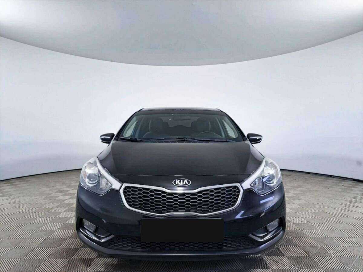 Kia Cerato с пробегом — 2014 год. Фото: #1