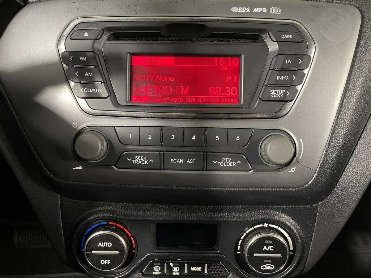 Kia Rio с пробегом — 2012 год. Фото: #11