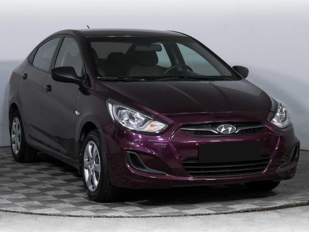 Hyundai Solaris с пробегом — 2014 год. Фото: #2