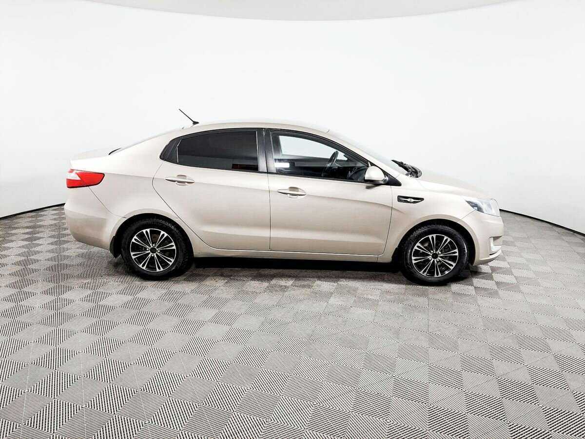 Kia Rio с пробегом — 2013 год. Фото: #3