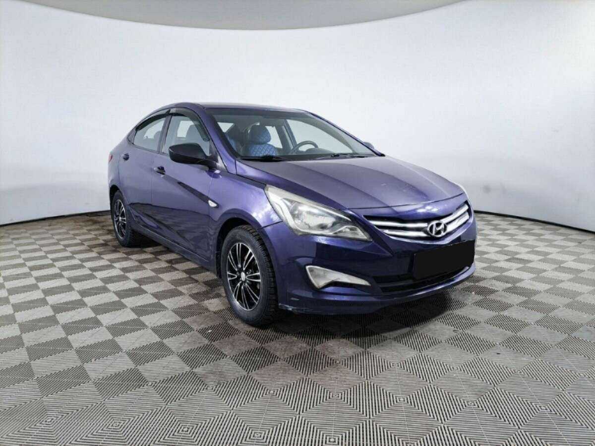 Hyundai Solaris с пробегом — 2014 год. Фото: #2